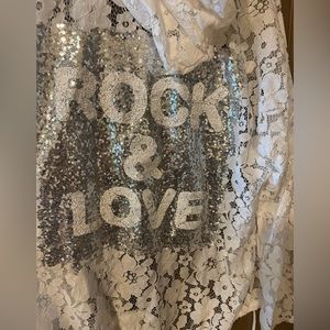 Really cool white lace summer jacket with silver sequins! One size.